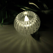 Transparent crystal-effect LED flameless tealight candle with flickering light
