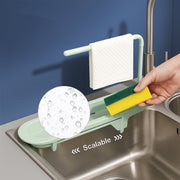 Close-up of adjustable sink rack’s telescopic extension feature