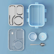 Open stainless steel lunch box showing three compartments and the bonus side container