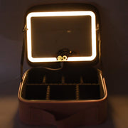 Pink LED light makeup organizer box with organized cosmetic storage