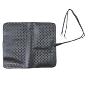 Foldable makeup brush case with wrap design ideal for travel and easy packing