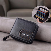 Close-up of zip-around card holder wallet in man's hand