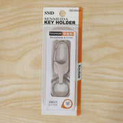 Metal keychain displayed with size reference