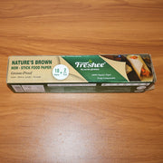 Lifestyle image showing non-stick brown food paper roll in kitchen setting