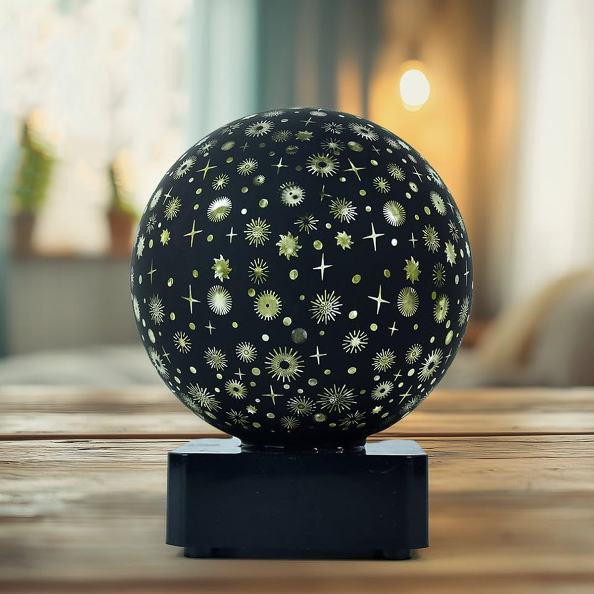 LED projection night lamp showing star pattern glowing softly
