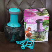Ergonomic manual vegetable and nut chopper for kitchen use.