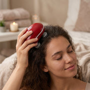 Close-up of the scalp massager's rotating nodes