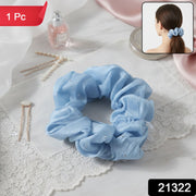 Close-up of a stretchable elastic soft fabric hair scrunchie accessory