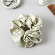Fabric hair scrunchie designed for minimal and elegant hairstyles