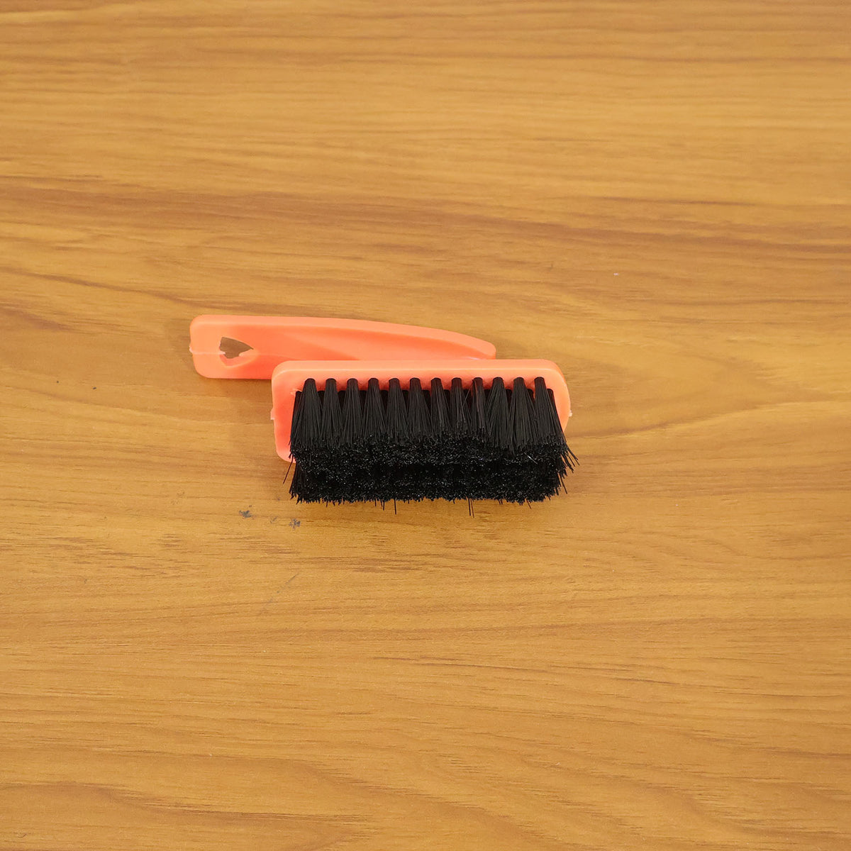 Shoe cleaning brush in live use cleaning sneakers and household surfaces