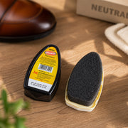 Portable shoe shiner liquid for quick shine, showing its sleek bottle.
