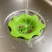 Flexible silicone drain hair catcher designed for bathroom wash basin drains.