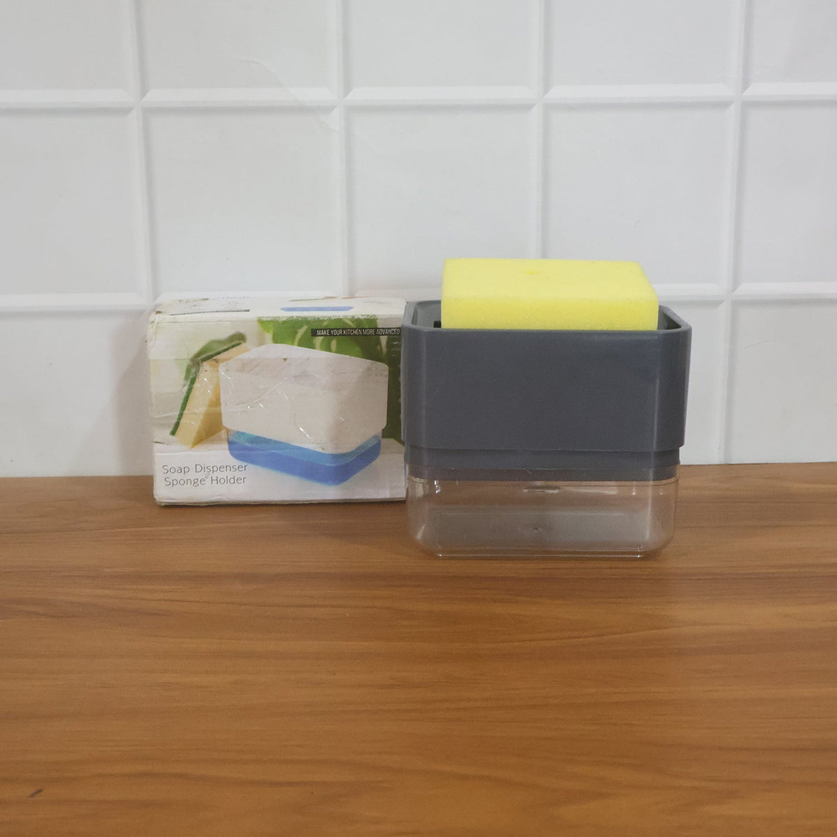 Neatly arranged kitchen sink organizer with soap and sponge