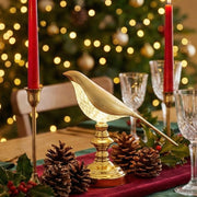 The Sparrow decorative table lamp illuminated, emphasizing its beautiful crystal design.