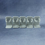 Kitchen wall spice holder installed with neatly arranged bottles