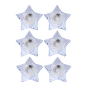 Battery operated LED candles in star-shaped holders for safe lighting