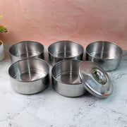 Closed stainless steel lunch box showing its sleek, round design.