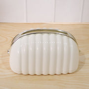 White shell style tissue dispenser front view