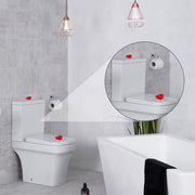 Yellow heart-shaped toilet tank button for practical bathroom use