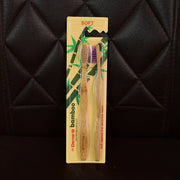 Angled view highlighting bamboo toothbrush with medium bristles
