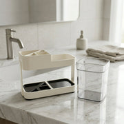 Brown plastic toothbrush holder in bathroom