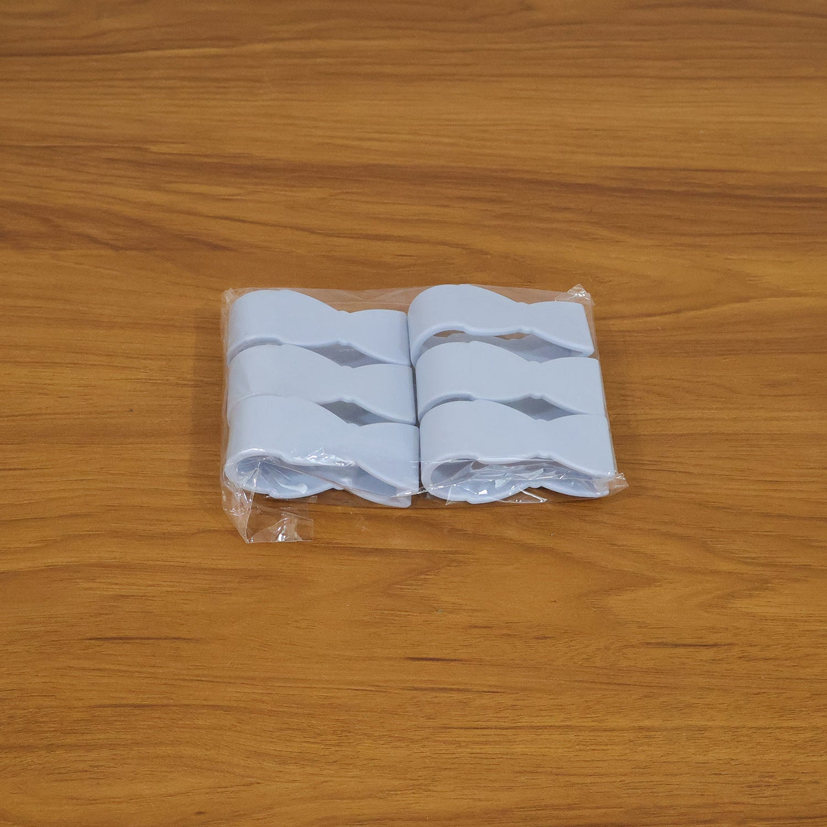 Multipurpose clips securing towels & cloths on various surfaces