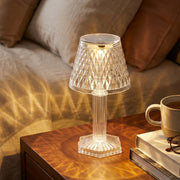 Close-up of the intricate plastic crystal design of the table lamp.