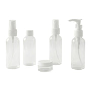 Travel bottle combo including pump, spray, and flip cap refillable containers