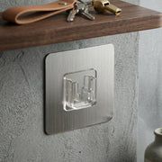 Wall hanging hook for keys and accessories with secure adhesive