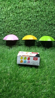 Vertical shot of the multi-functional umbrella wall hook, showcasing its hanging capabilities.