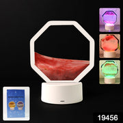 LED sand art lamp casting calming colored light creating a tranquil desktop ambiance
