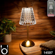 Close-up of crystal table lamp showcasing crystal-cut shade and warm ambient LED light