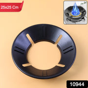 Close-up of gas stove burner with flame protector ring enhancing flame efficiency