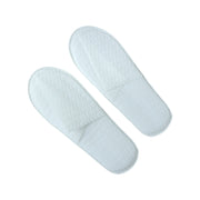 White bedroom slippers with cushioned soles and anti-slip base