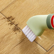 Compact cleaning brush with integrated scraper ideal for corners and tight spaces