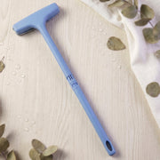 The soft bristles of the window mesh cleaner gently cleaning delicate screen surfaces.