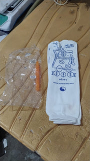 Packaging and accessories for reflexology acupressure socks including massage stick
