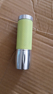 A detailed shot of the battery compartment of the Mini LED Flashlight.