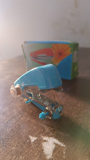 Top-down view of the portable mini sewing machine, showing its compact size.