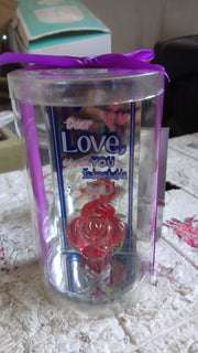 The Rose Showpiece creating a romantic ambiance in a dimly lit setting.