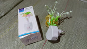 The energy-efficient mushroom night light with its auto on/off sensor in action.
