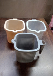 Plastic Bath Mug placed in a bathroom setting, ready for use during bathing.