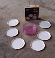 Plastic coasters effectively safeguarding furniture from hot beverage marks and spills.