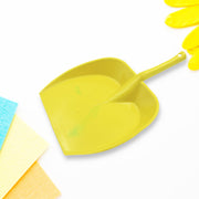 Storenzo long handle dustpan standing upright, ready for use.