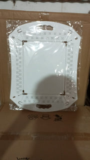 Compactly folded plastic serving tray, highlighting its space-saving design for easy storage.