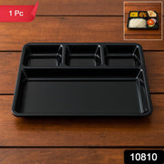 Black plastic 4-section rectangular meal tray with raised edges to prevent spills.