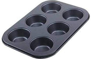Non-stick muffin tray showing its robust construction and multiple slots.