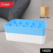 Close-up of a compact drawer organiser with individual compartments for socks and undergarments.