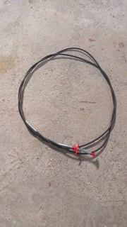 The effective drain cleaner tool with its spring and claw, designed for easy clog removal.