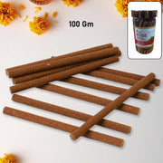 Loban Dhoop Stick burning in an incense holder, with smoke rising gently.
